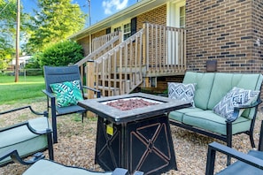Unwind on our comfy patio chairs with a fire in the firepit