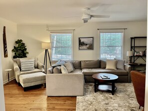 View from kitchen/dining room into comfortable living room 