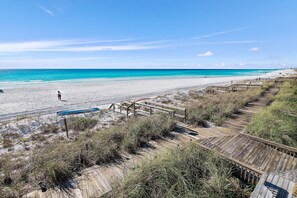 This BEACHFRONT Townhomes features Big Gulf Views from 3 Patios, the Living Rooms, and the Master Bedroom - Come Relax!