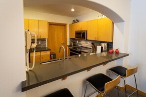 Indoors,Chair,Furniture,Kitchen,Microwave