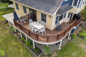 Great wrap-around deck with outdoor dining, grill