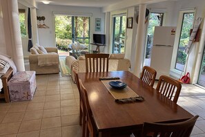 Dining area, Fridge freezer, TV and lounge area.