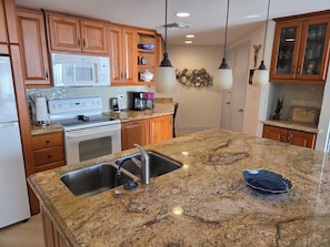 kitchen with large island and granite counters