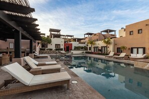 Community pool and Jacuzzi just a few steps from the villa 