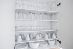 Fully stocked dinnerware and glassware