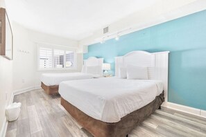Relax in a serene 1BR oceanfront retreat with a cozy bedroom overlooking Beach Cove. Features 2 plush queen beds, linens, and coastal decor. Wake up to breathtaking ocean views through large windows, with gentle waves setting a peaceful tone.