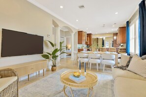 TV in the living rom; the dining area is just next to the living room