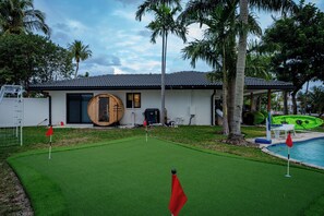 A great spot to relax with a putting green, sauna, and poolside fun.