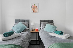 Bedroom showing 2 singles that can be made in to a king size bed
