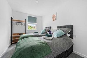 Bedroom 2 shown with 2 singles can be made into a king size bed