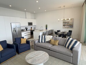 Full kitchen with breakfast bar and separate indoor dining area