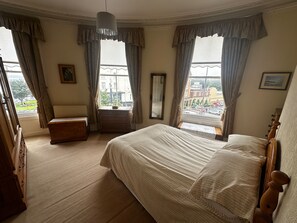 Double Bed, wardrobes and chest of drawers. Same floor as the main bathroom. Sea views