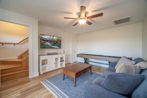 Lower Level Living Area with  Shuffleboard Table