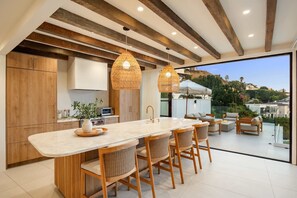 Savor meals with the beauty of the Hollywood Hills.