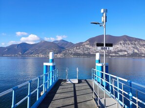 Blue, Water, Body Of Water, Coastal And Oceanic Landforms, Sea, Lake, Handrail, Ocean, Sound, Fence