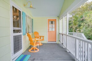 View of upstairs porch and entry.