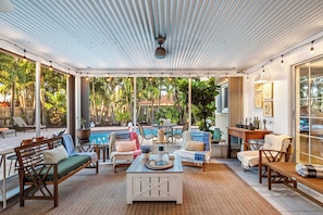 A outdoor screened in area come rain or shine