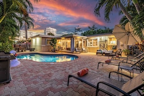 The paved backyard and pool area is very spacious!