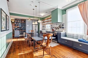 Full kitchen and dining area
