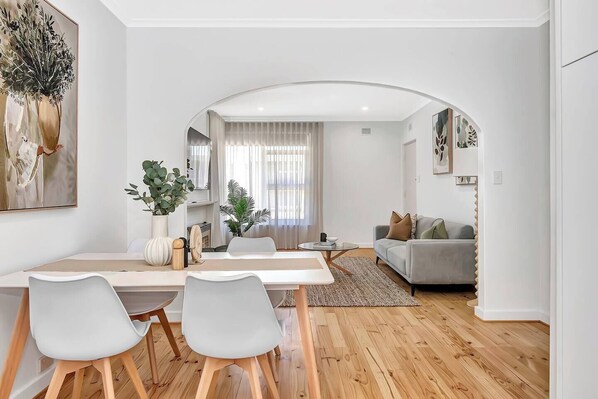 A cosy sofa is perfect for settling in with some TV, while split system air conditioning and heating ensure year-round comfort.