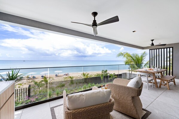 Enjoy the fresh Caribbean Sea breeze while sipping your morning coffee