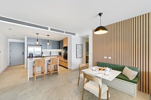 The condo's open-plan layout welcomes an abundance of natural light