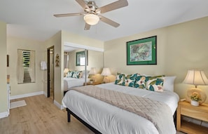 Primary bedroom features a king bed