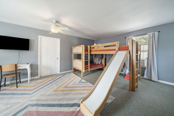 Bedroom #1 w/L-shaped 2 twin-over-twin bunk and to top bunk full bed w/slide