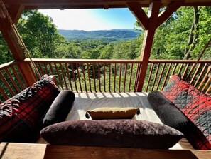 Unwind at the end of the day with a swing over the Smokies before you retire to our cozy king poster bed.