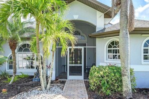 Front Entrance With Screened in Front Patio