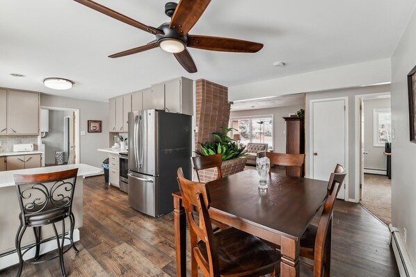 Indoors, Ceiling Fan, Furniture, Table, Dining Room