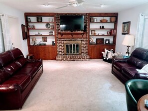 Den. Leather La-Z-Boy queen sofa bed & love seat, Big screenTV.