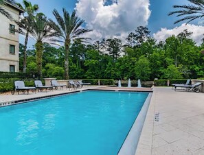 Lots of loungers by the pool