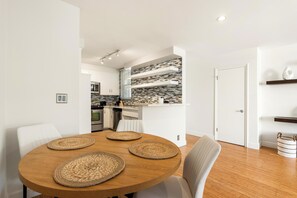 Stylish dining space with seating for four—perfect for meals & memories!







