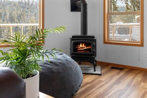 Cozy fireplace vibes in the open layout living room!