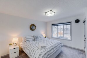 Primary suite, with king sized bed.