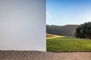Garden with a view (view from the main gate to the car parking) 