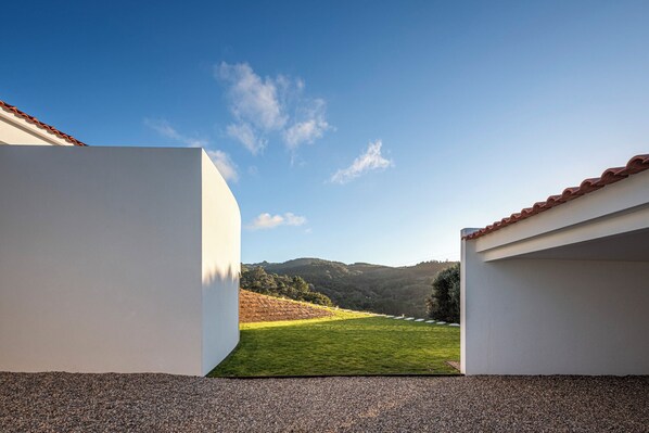 Garden with a view (view from the main gate to the car parking) 