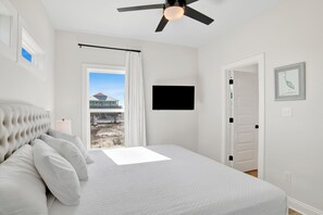 1st Floor Master Bedroom 1 has a mounted TV and a private bathroom