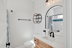 1st Floor Master Bathroom with a tiled walk-in shower