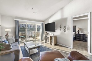Curl up on the queen sleeper sofa & stream your favorites on the smart TV