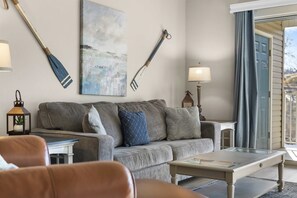 Curl up on the queen sleeper sofa & stream your favorites on the smart TV