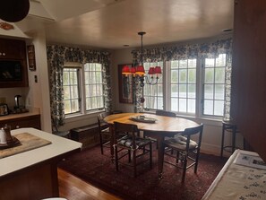 view of dining area from kitchen