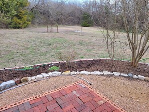 Backyard is completely fenced.  New pictures once it greens up!