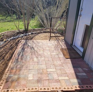 back patio (notice the doggy door that opens to the laundry room)