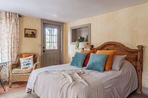 Bedroom 4: Queen sized bed. Downstairs Mother-in-law suite with private patio