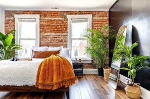 this plant-filled bedroom is a guest favorite for comfort & design 🌿 recharge in style after exploring the city