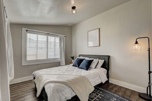 Sweet dreams in our cozy bedrooms! Your affordable 2-bedroom escape awaits.
