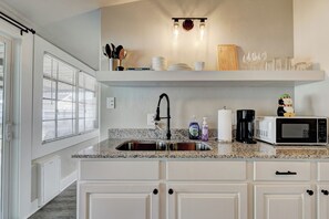 Cook up some savings! Our kitchen is fully equipped for your affordable 2-bedroom stay."