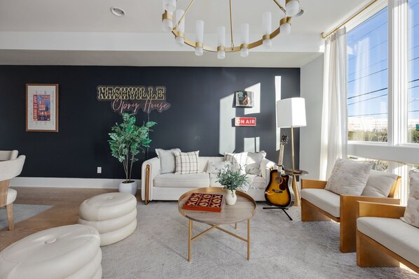 Cozy up in the spacious living room—perfect for movie nights or relaxing after a day in Music City. - The Opry - Nashville, TN
